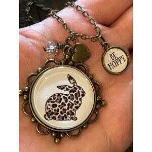 Leopard Print Bunny Pendant Necklace With "Be Hoppy" Charm & Heart Accent On Ant